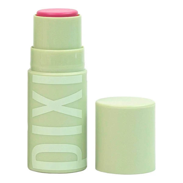 Pixi pink blush stick in pale-green packaging with matching cap beside it