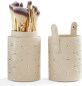 Beige makeup brush set with gold studs quilted travel case open into two cups