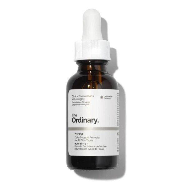 The Ordinary B Oil amber bottle with white dropper
